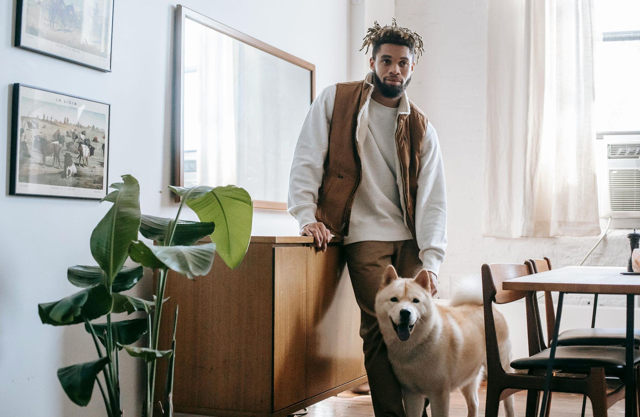 White Dog and Tenant in White Apartment