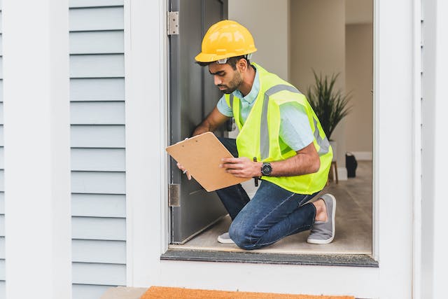 a-person-inspecting-property